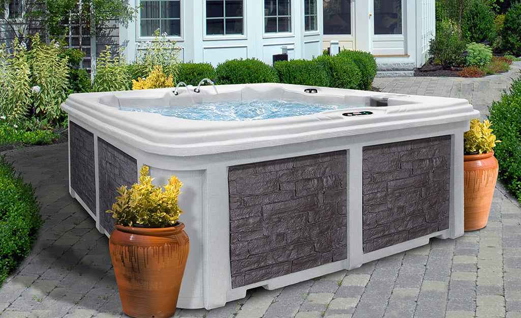 Aspen Spas Arcadia Luxury Hot Tub – 7-Person Spa with Dual Captain’s Chairs & Open Footwell, 8' Design